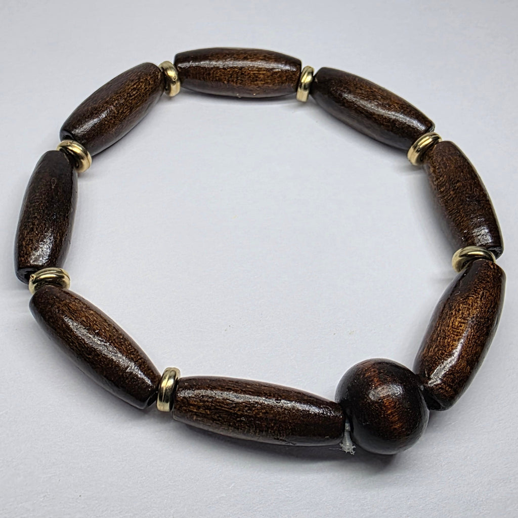 Brown beaded bracelet on a light gray background